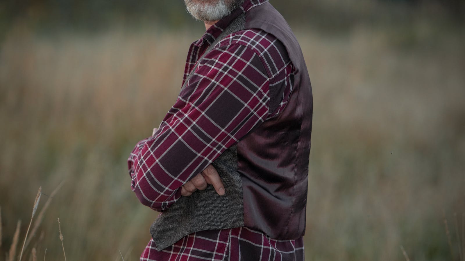 Low Libido in Men: Why Your Drive Drops and How to Address It Mature man with salt and pepper hair in plaid shirt